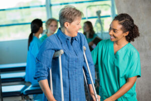 woman on crutches with a broken leg