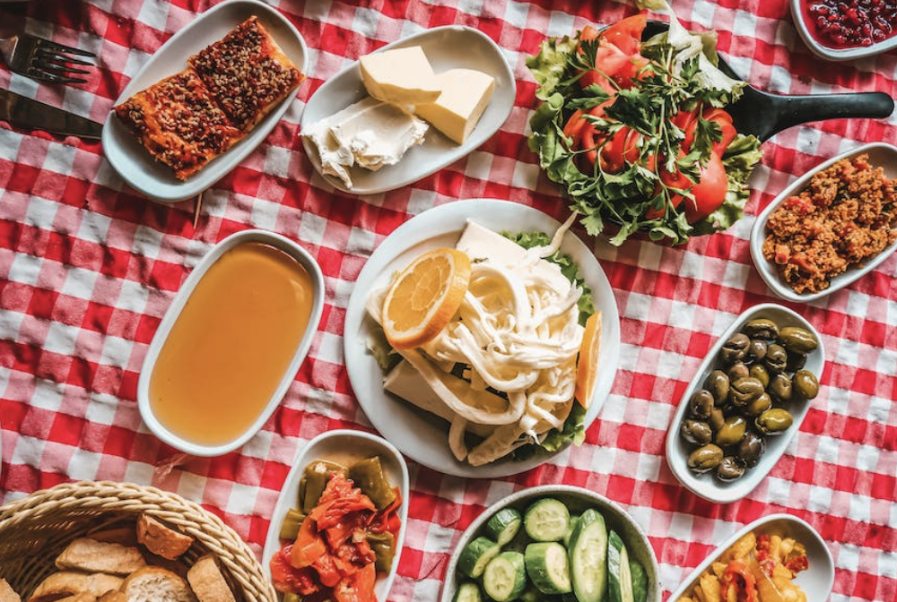 food spread on a red tablecloth