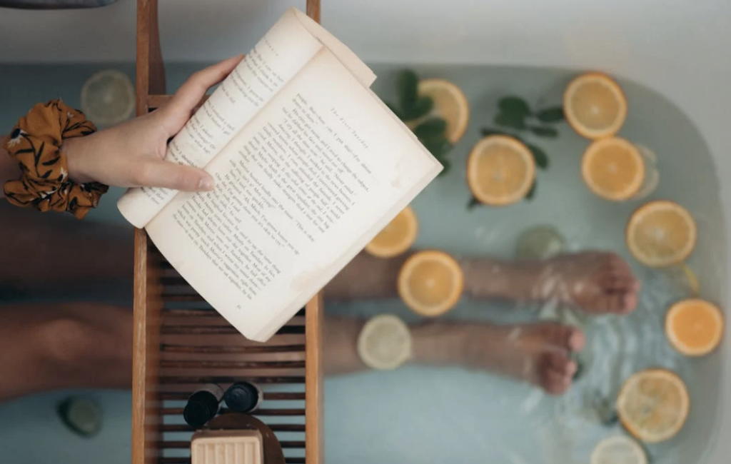 person reading in a bath